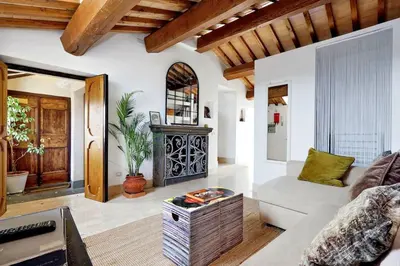 a living room with a couch and a table at Pantheon Stylish Attic in Rome