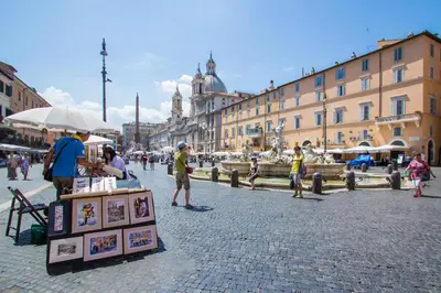 a group of people standing in a street at Nice Apartment Navona Square in Rome