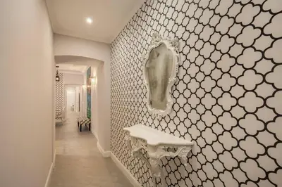 a bathroom with a sink and a toilet on the wall at Flat with terrace by Vatican in Rome