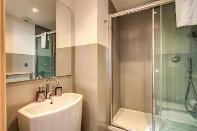 a bathroom with a sink and a shower at Guest House o Affittacamere Magenta Fico 2 in Rome
