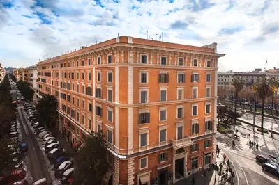 a large brick building on the side of a street at DaliTourism - Vatican Apartment 9 in Rome
