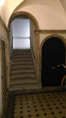 a staircase in a room with a stair case at Navona Charme Suite in Rome