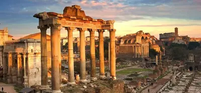 an ancient building with columns in a city at Da Adriana al vaticano in Rome