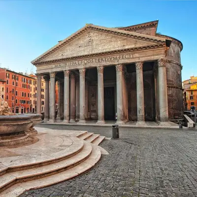 a building with a fountain in front of it at Da Adriana al vaticano in Rome