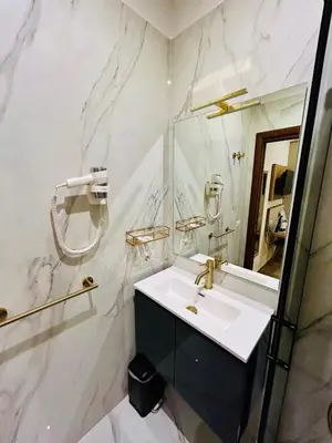 a bathroom with a sink and a mirror at ImeraRooms in Rome