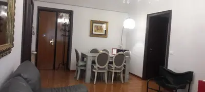 a dining room with a table and chairs at Family`s Apartment Trastevere in Rome