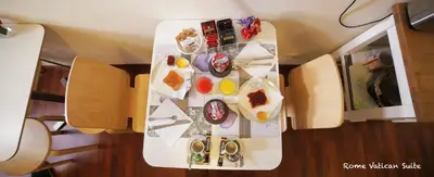 an overhead view of a table with food on it at Rome Vatican Suite in Rome