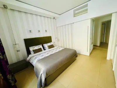 a bedroom with a large bed in a room at Interno 5 B&B in Rome