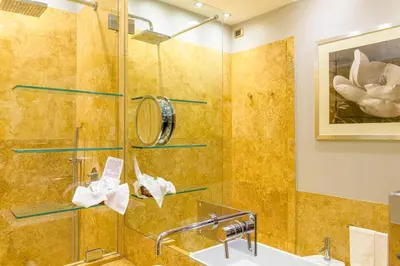 a bathroom with a shower and a sink at Hotel S. Anna in Rome
