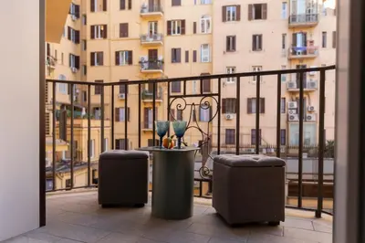 a balcony with a view of a building at ROMAC Mazzini with 5 bedrooms near the Vatican in Rome