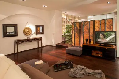 a living room with a couch and a tv at SK ROME Apartment Luxury Torre Argentina in Rome