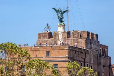 a statue on the top of a building at SK ROME - Apartment Luxury Navona in Rome