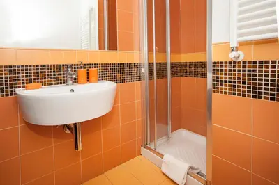 a bathroom with a sink and a shower at Flowerome in Rome