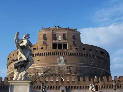 a building with a statue in front of it at Vaticano Private Apartment in Rome