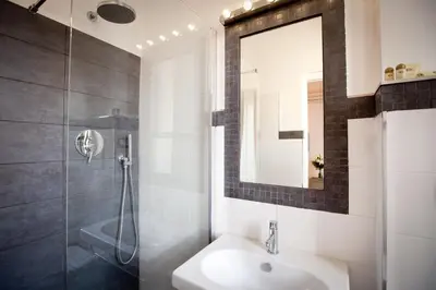 a bathroom with a sink and a shower at Castellani A San Pietro in Rome
