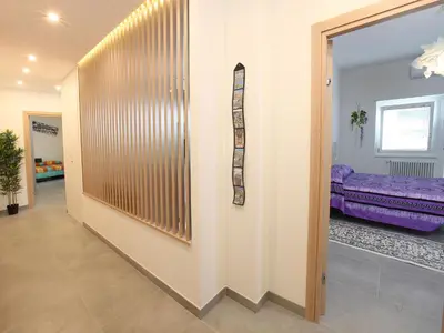 a hallway with a door leading to a bedroom at Appartamento Turistico Laura in Rome