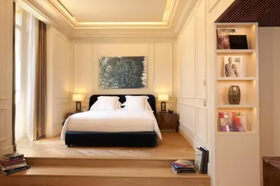 a bedroom with a bed with two pillows at The First Arte - Preferred Hotels & Resorts in Rome