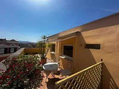 a balcony of a house with a sink on it at All Comfort Astoria Palace in Rome