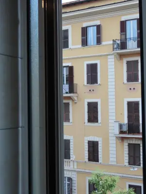 a view of a building from a window at In the Center by Local Domus in Rome