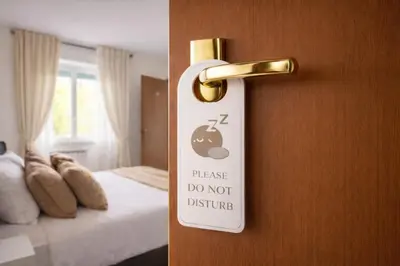 a sign on a door that says please do not disturb at Amelia 5 in Rome