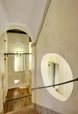 a room with a large circle on the wall at Relais Orso in Rome