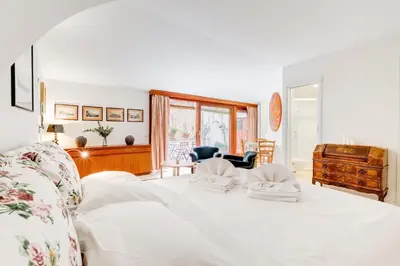 a bedroom with a bed with two towels on it at Al Portico 39 apartment with terrace in Rome