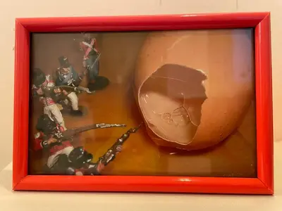 a framed picture of a ball and some action figures at Rhome86 in Rome