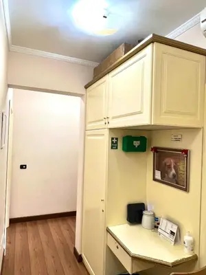 a room with a white cabinet and a door at Termini station holidays in Rome