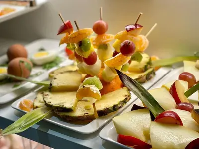 a bunch of appetizers on plates on a table at THE ONE Boutique Hotel & SPA Roma in Rome