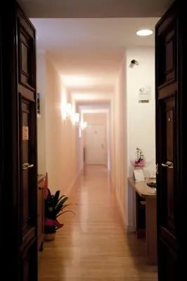 a hallway leading to a room with a hallway at Residenza Dei Gracchi in Rome