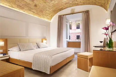 a bedroom with a bed and a window at Magica Luna Boutique Hotel - Roma in Rome