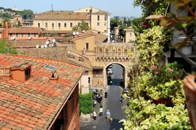 a view of a city with a bridge and buildings at Scala Luxury Terrace studio in Rome