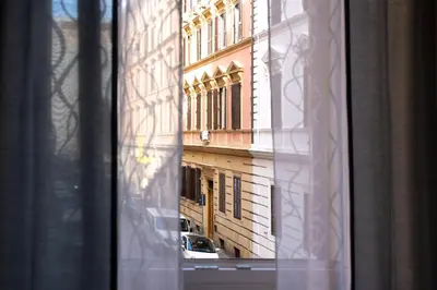 a view of a building from a window at Urbanflat Repubblica Square in Rome