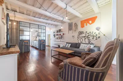 a living room with a couch and a table at CS Spanish Steps Apartment in Rome