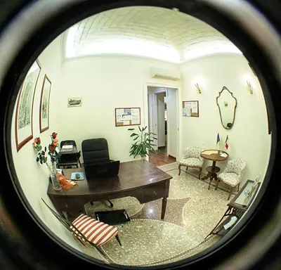 a view of a living room with a table and chairs at Domus Real Cardello in Rome