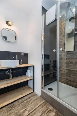 a bathroom with a shower and a sink at co.sleep in Rome