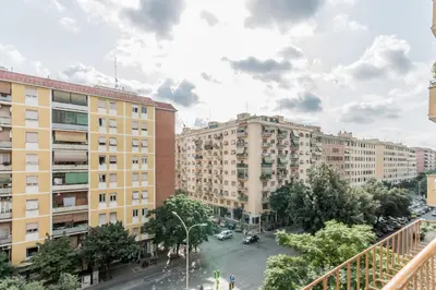 an aerial view of a city street with buildings at MARCONI 94 - APARTMENT&PRIVATE ROOMS in Rome