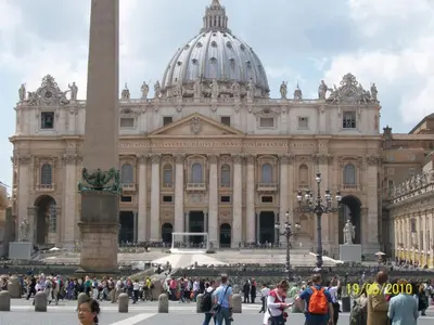 a large building with a large tower in front of it at Le Terrazze Del Vaticano in Rome