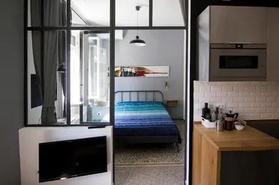 a small bedroom with a bed in a room at Appart in Rome