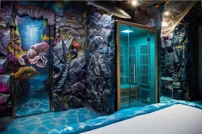 a room with a underwater room with a mirror at MagicSuite Guest House Roma Portuense in Rome