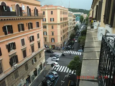a view of a city street with cars and buildings at VaticanSky rooms in Rome
