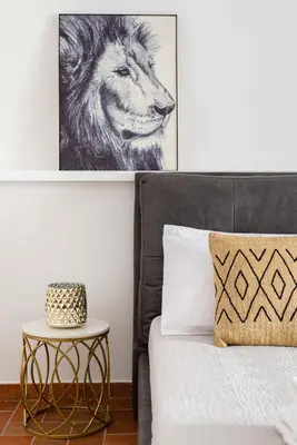 a bedroom with a large bed with two tables at Navona 7 Suite in Rome