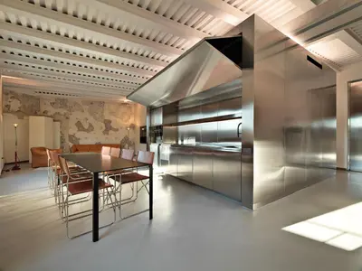 a dining room with a table and chairs at Rhinoceros in Rome