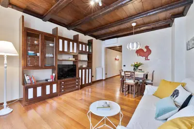 a living room with a couch and a table at Rome As You Feel - Cancelleria Apartment in Navona in Rome