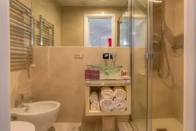 a bathroom with a shower and a toilet and a sink at Ripetta Luxury Del Corso in Rome