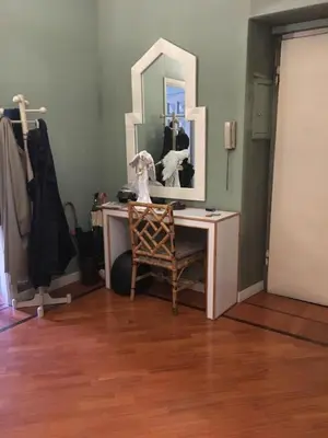 a room with a desk with a mirror and a chair at Elle house Roma in Rome