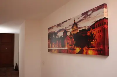 a painting hanging on a wall in a room at Lofts In Rome in Rome