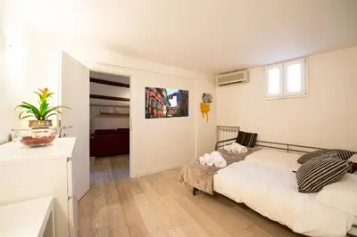 a bedroom with a bed in a room at CasaJusta Trastevere in Rome