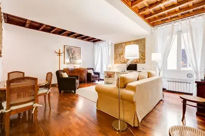 a living room with a couch and a table at Diana-Spanish Steps House in Rome