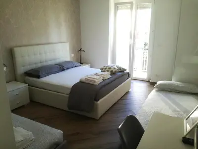a bedroom with a bed with towels on it at Appia Garden in Rome